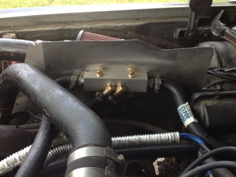 1981 Ford LTD - Another shot of the manifold. You can see the hose routing better here. The fan sensors are on the bottom. I spray painted the wires: blue…