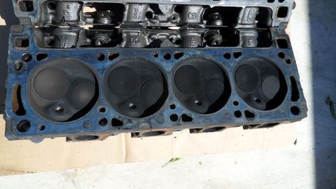 1972 Ford Ranchero - Close-up of an engine cylinder head, showing the combustion chambers and Ford casting marks.