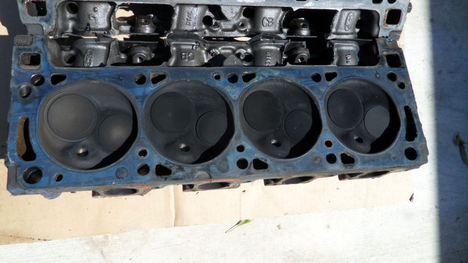 Engine cylinder head with visible Ford casting marks