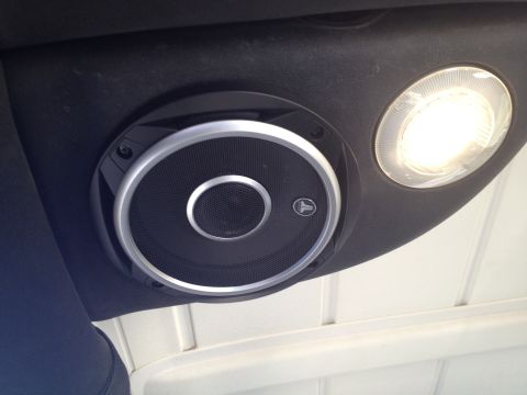 2005 Jeep Wrangler - Vehicle interior showing a speaker and overhead light.
