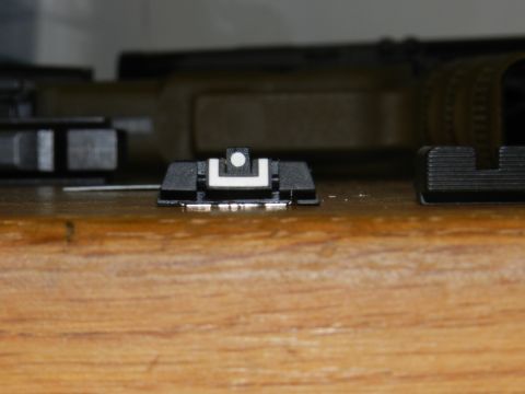 1996 Ford Bronco - Close-up of gun sights, not a vehicle part.