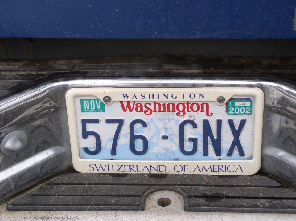 Washington license plate 576-GNX on a vehicle's rear bumper