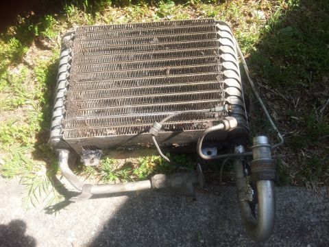 1976 Ford Ranchero - This is a car's air conditioning condenser, likely removed for repair or replacement.