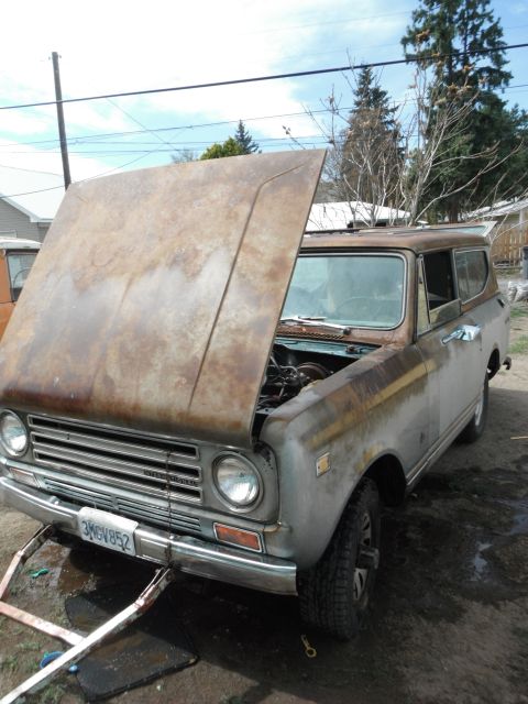 1972 International Scout II - This vintage International Scout II is showing its age with significant rust on the hood and body panels.
