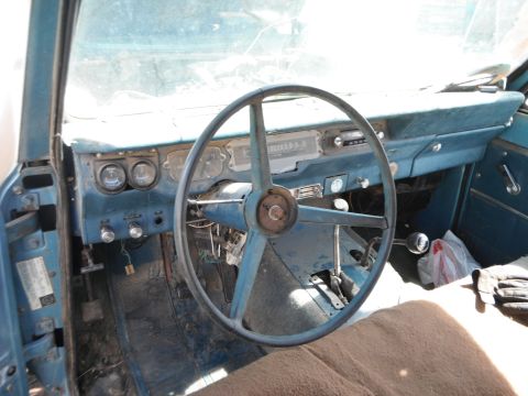 1972 International Scout II - The interior of a 1972 International Scout II reveals its dashboard, steering wheel, and various controls.