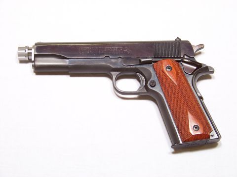 1995 Mercury Grand Marquis - A pistol is displayed against a white background, with a watermark at the bottom right.