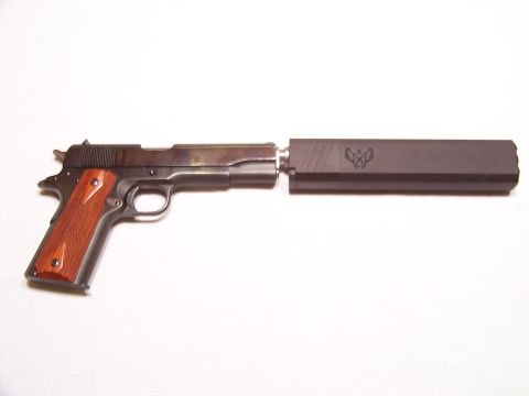 1995 Mercury Grand Marquis - A pistol with a suppressor is shown against a white background.