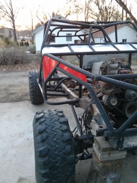 1986 Ford Bronco - This custom buggy frame is undergoing construction, a roll cage and large off-road tires.
