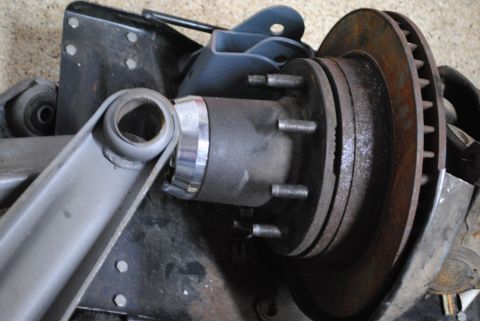 1986 Ford Bronco - Close-up of a Dana 50 TTB front axle hub and rotor assembly, likely from a Ford truck or Bronco.