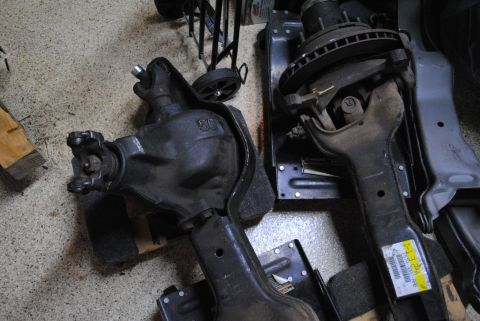 1986 Ford Bronco - Two Dana 50 TTB axle components are visible, one with a "50" marking.