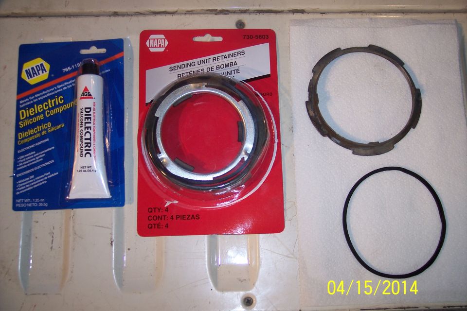 NAPA dielectric silicone compound and a package of sending unit retainers with a separate retainer ring and gasket