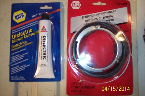 1990 Ford Bronco - Two NAPA auto parts packages are displayed, one for dielectric silicone compound and another for sending unit retainers.