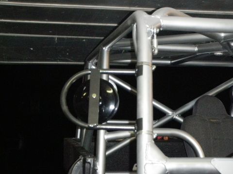 1961 International Scout 800 - Close-up view of a vehicle's interior roll cage and a side mirror.