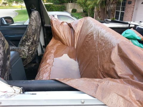 1992 Ford Bronco - It poured yesterday and I mean torrential....the only thing the tarp did was keep the water off my back seat. there was a pool of water in…