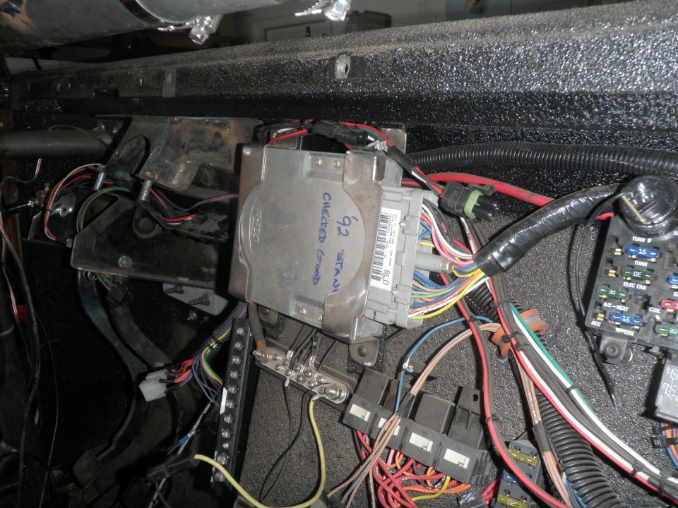 Vehicle's engine control module and wiring, with handwritten notes '92 STAND CHECKED GOOD'