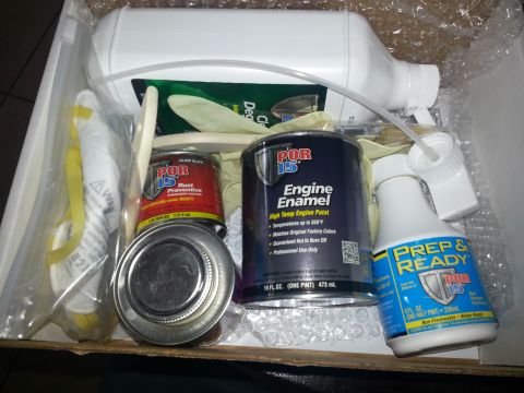 1994 Ford Bronco - A kit containing POR-15 engine enamel, rust preventative, prep and ready solution, gloves, and degreaser is shown in a box.