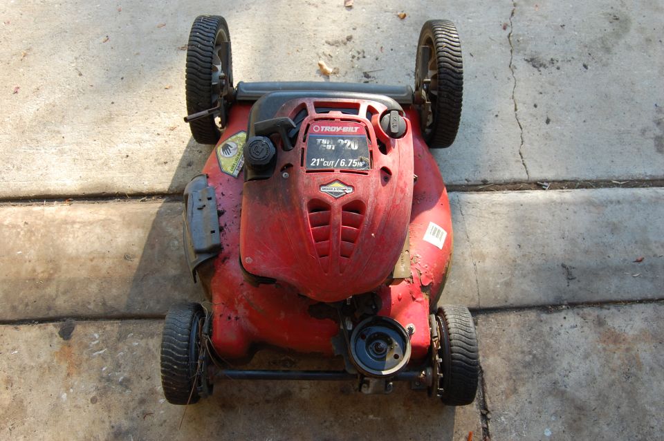 Red Troy-Bilt lawn mower with 21" cut/6.75 HP engine