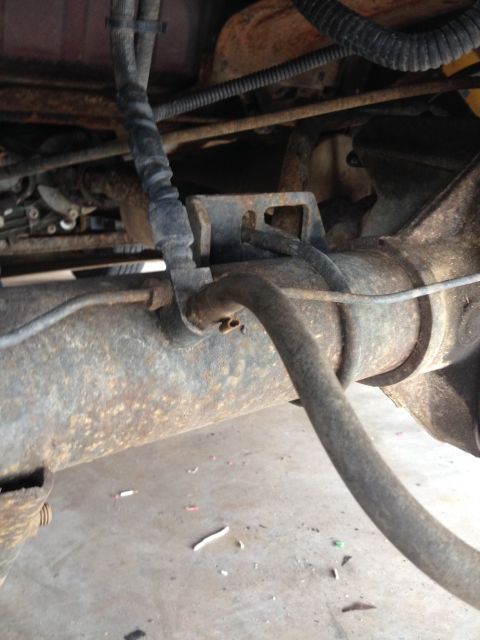 1995 Ford Bronco - The hose in question is the one going towards the camera to the bottom right. It is not connected to anything and its coming from my 8.8. I…