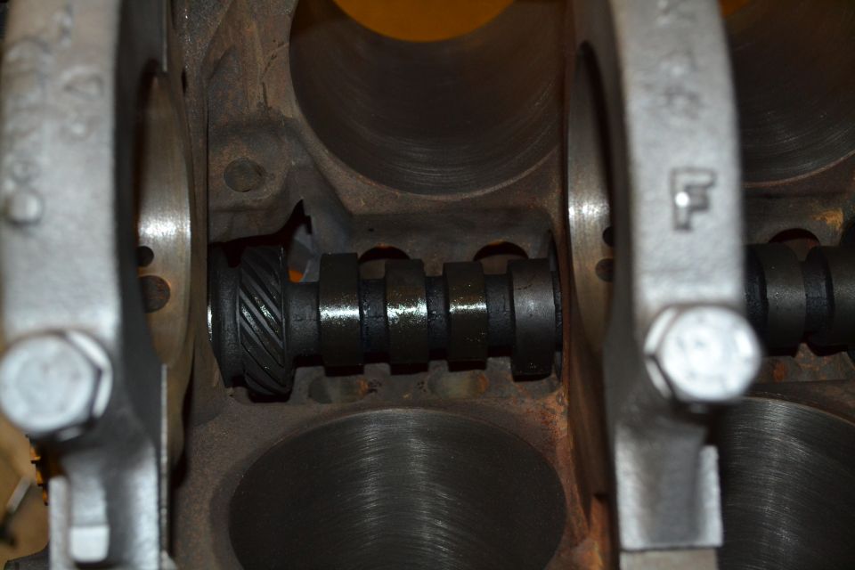 Close-up of an engine's camshaft and cylinder walls
