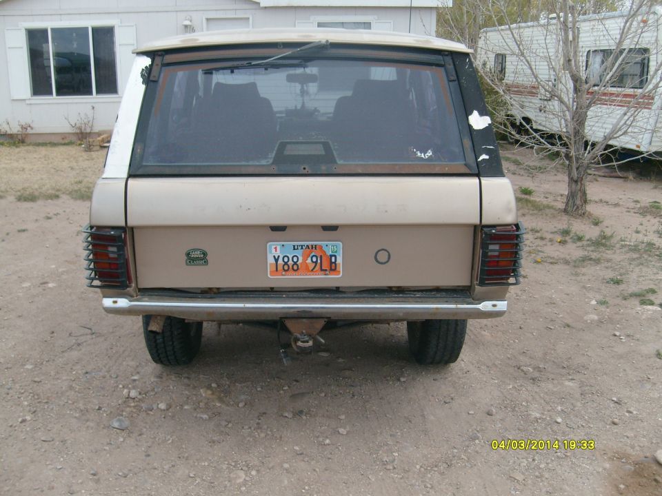 Rear view of a 1991 Land Rover Range Rover with Utah license plate Y88 9LB
