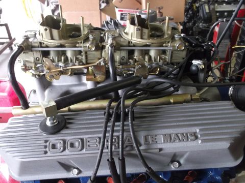 1967 Ford Mustang - Engine features Cobra Le Mans valve covers and a dual carburetor setup, suggesting a performance-oriented build.