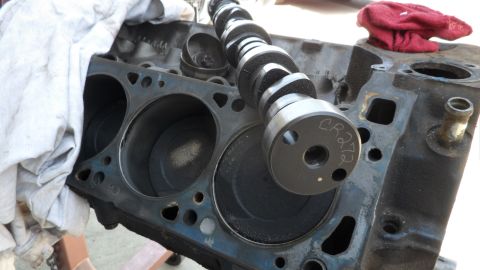 1972 Ford Ranchero - Close-up of an engine block with a camshaft resting on top, showing internal cylinder components.