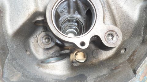 1972 Ford Ranchero - A detailed view of an internal engine part, showing mechanical components and metal casting.