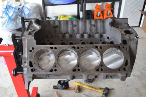 1981 Ford F-250 - This is a close-up view of a bare engine block, likely undergoing rebuild or inspection.