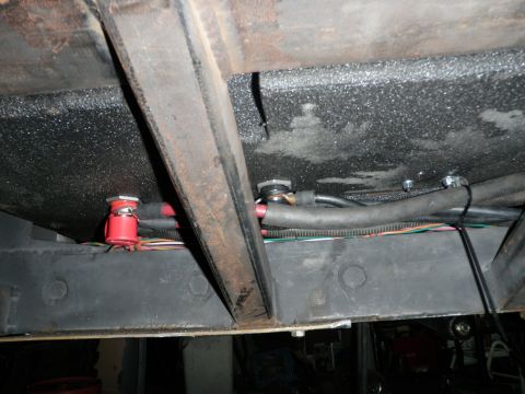 1961 International Scout 800 - Underbody view shows wiring and a red electrical component attached to the frame.