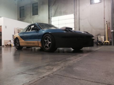 1995 Ford Probe - This modified coupe has a two-tone paint scheme and an aggressive aftermarket front end.