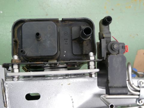 close-up of a fuel vapor canister and purge valve assembly