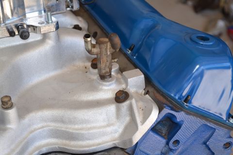 1981 Ford F-250 - Engine components, including a silver intake manifold and a blue valve cover, are shown in detail.