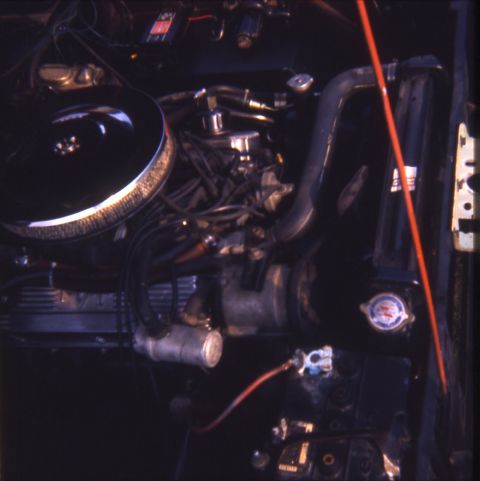 1996 Ford Bronco - Close-up view of an engine bay, showing various components and wiring.