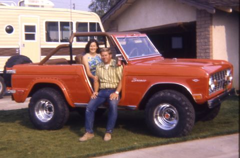 1996 Ford Bronco - A couple poses with their classic Ford Bronco, which appears to be from the early 1970s.
