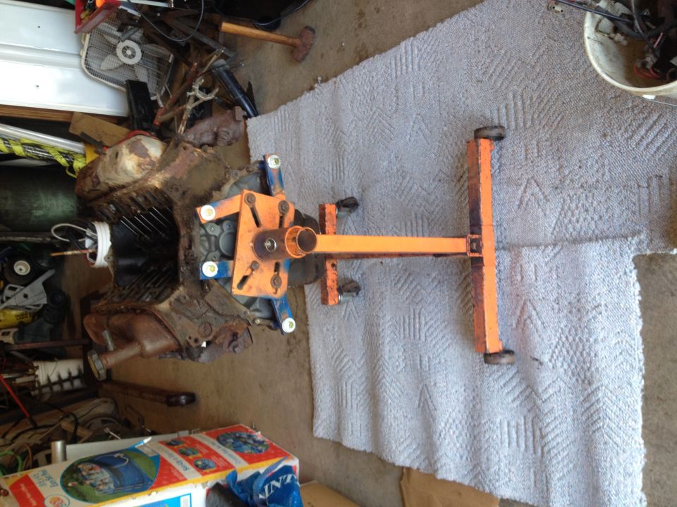 Engine on an orange engine stand, viewed from the side