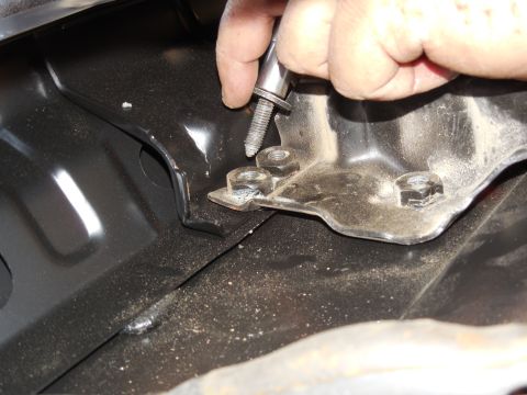 1983 Ford Bronco - To perfectly center the swingaway strike bolt holes, first install the brace to the t/g, with this upper area centered over the welded & pu…