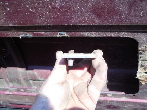1983 Ford Bronco - The bottom hinge bolts commonly rust, seize, cross-thread, and break. If this happens, use a good bolt as a drift to hammer the nut plate i…