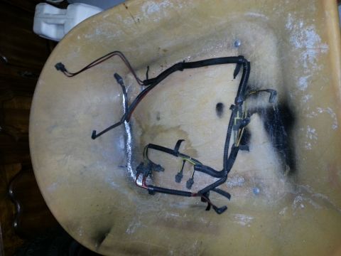 1994 Ford Bronco - A tan fiberglass interior component with a black wiring harness is visible.