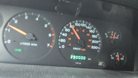 1991 Ford LTD Crown Victoria - Vehicle's interior dashboard displays speed, engine RPM, and odometer readings.