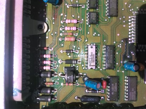 1992 Ford Bronco - A detailed view of an electronic circuit board, showing a complex arrangement of components and wiring.