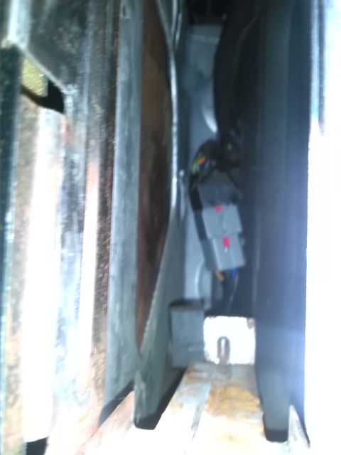 1992 Ford Bronco - An electrical connector with visible wiring is shown in this close-up view.