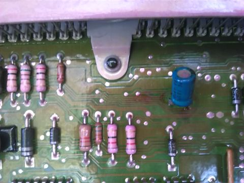1992 Ford Bronco - Electronic circuit board with resistors, diodes, and a capacitor visible.