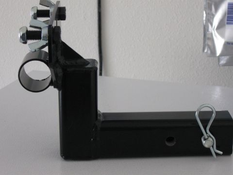1999 Ford Ranger - This black metal accessory mount features wing nuts and bolts for secure attachment to a hitch receiver.