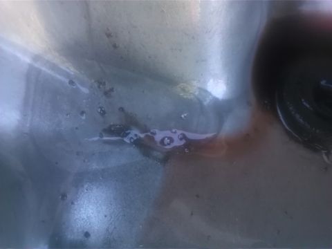 1992 Ford Bronco - The image shows a close-up of an engine oil pan, not a vehicle.
