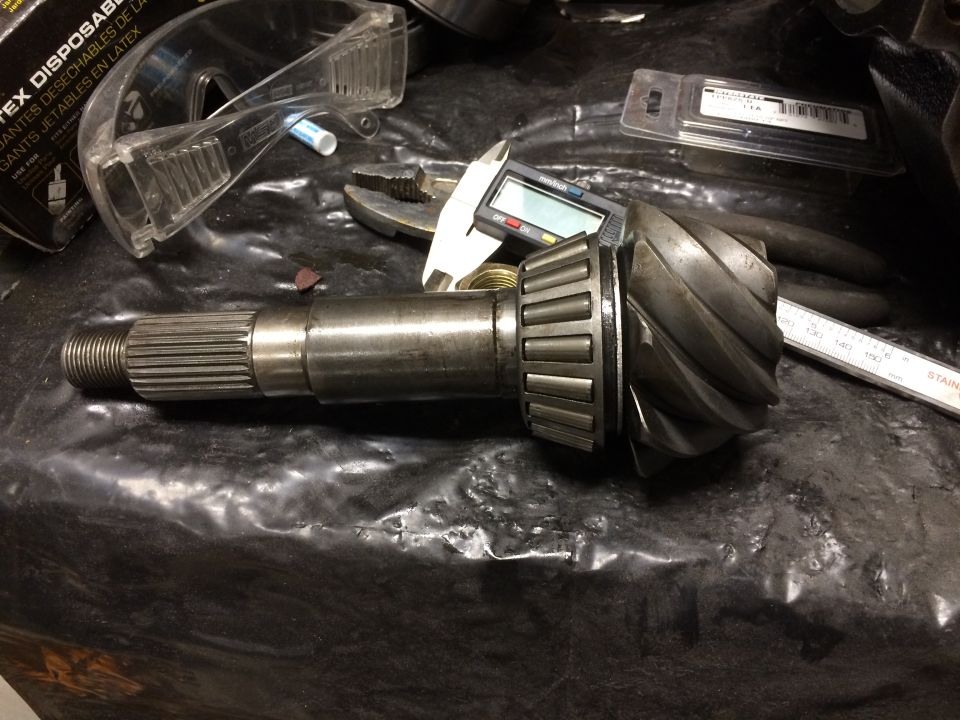 Differential gear and axle shaft with digital caliper and ruler