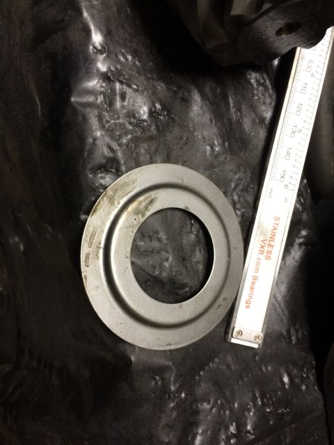1996 Ford Bronco - A metal ring is shown next to a ruler, with text indicating "STAINLESS VX8.com Bearings" visible on the ruler.