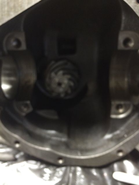 1996 Ford Bronco - Close-up view of a differential housing, revealing internal gears and mounting hardware.