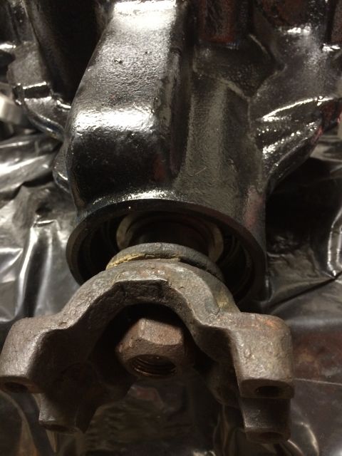1996 Ford Bronco - Detail of a vehicle's differential housing and a connected suspension component, likely a part from a Ford Bronco.