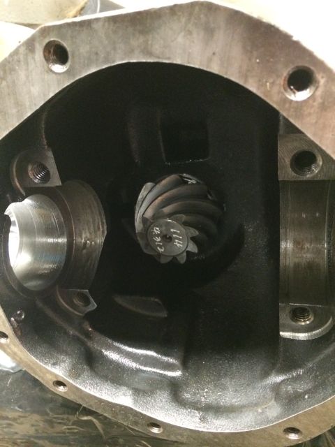 1996 Ford Bronco - Close-up view of a differential housing showing internal gears and markings.