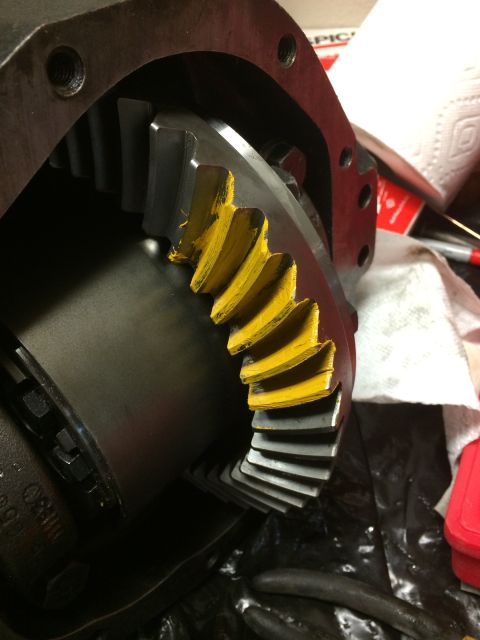 1996 Ford Bronco - Differential gears are shown with yellow paint applied to the teeth for inspection.